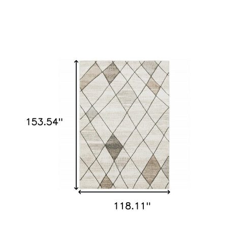 3' X 5' Beige Grey Tan And Brown Geometric Power Loom Stain Resistant Area Rug